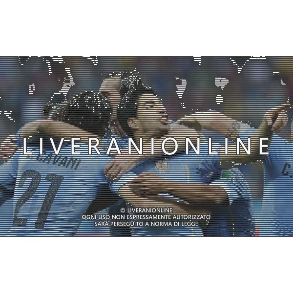 (140619) -- SAO PAULO, June 19, 2014 () -- Uruguay\'s Luis Suarez (R) celebrates for his goal with his teammates during a Group D match between Uruguay and England of 2014 FIFA World Cup at the Arena de Sao Paulo Stadium in Sao Paulo, Brazil, June 19, 2014.(/Zhou Lei)(pcy) 2014 FIFA World Cup Brazil Group D match between Uruguay and England at Arena de Sao Paulo on June 19, 2014 in Sao Paulo, Brazil. ©photoshot/Agenzia Aldo Liverani sas - ITALY ONLY - EDITORIAL USE ONLY