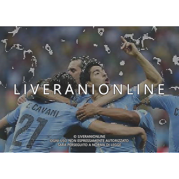 (140619) -- SAO PAULO, June 19, 2014 () -- Uruguay\'s Luis Suarez (R) celebrates for his goal with his teammates during a Group D match between Uruguay and England of 2014 FIFA World Cup at the Arena de Sao Paulo Stadium in Sao Paulo, Brazil, June 19, 2014.(/Zhou Lei)(pcy) 2014 FIFA World Cup Brazil Group D match between Uruguay and England at Arena de Sao Paulo on June 19, 2014 in Sao Paulo, Brazil. ©photoshot/Agenzia Aldo Liverani sas - ITALY ONLY - EDITORIAL USE ONLY