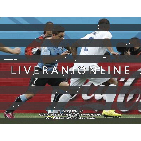 (140619) -- SAO PAULO, June 19, 2014 () -- England\'s Glen Johnson (front) defends against Uruguay\'s Cristian Rodriguez during a Group D match between Uruguay and England of 2014 FIFA World Cup at the Arena de Sao Paulo Stadium in Sao Paulo, Brazil, June 19, 2014.(/Zhou Lei)(pcy) 2014 FIFA World Cup Brazil Group D match between Uruguay and England at Arena de Sao Paulo on June 19, 2014 in Sao Paulo, Brazil. ©photoshot/Agenzia Aldo Liverani sas - ITALY ONLY - EDITORIAL USE ONLY