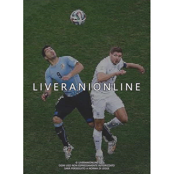 (140619) -- SAO PAULO, June 19, 2014 () -- Uruguay\'s Luis Suarez competes for a header with England\'s Steven Gerrard during a Group D match between Uruguay and England of 2014 FIFA World Cup at the Arena de Sao Paulo Stadium in Sao Paulo, Brazil, June 19, 2014.(/Liao Yujie)(rh) 2014 FIFA World Cup Brazil Group D match between Uruguay and England at Arena de Sao Paulo on June 19, 2014 in Sao Paulo, Brazil. ©photoshot/Agenzia Aldo Liverani sas - ITALY ONLY - EDITORIAL USE ONLY