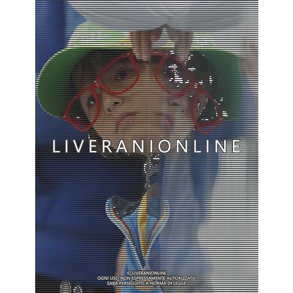 (140619) -- SAO PAULO, June 19, 2014 () -- A fan is seen before a Group D match between Uruguay and England of 2014 FIFA World Cup at the Arena de Sao Paulo Stadium in Sao Paulo, Brazil, June 19, 2014.(/Zhou Lei)(pcy) 2014 FIFA World Cup Brazil Group D match between Uruguay and England at Arena de Sao Paulo on June 19, 2014 in Sao Paulo, Brazil. ©photoshot/Agenzia Aldo Liverani sas - ITALY ONLY - EDITORIAL USE ONLY