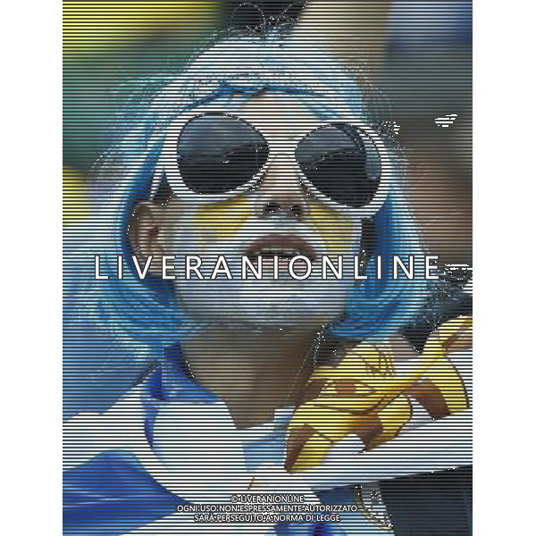 (140619) -- SAO PAULO, June 19, 2014 () -- An Uruguay\'s fan is seen before a Group D match between Uruguay and England of 2014 FIFA World Cup at the Arena de Sao Paulo Stadium in Sao Paulo, Brazil, June 19, 2014.Uruguay won 2-1 over England on Thursday.(/Chen Jianli)(pcy) ©photoshot/Agenzia Aldo Liverani sas - ITALY ONLY - EDITORIAL USE ONLY