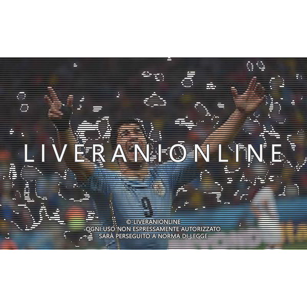 (140619) -- SAO PAULO, June 19, 2014 () -- Uruguay\'s Luis Suarez celebrates for his goal during a Group D match between Uruguay and England of 2014 FIFA World Cup at the Arena de Sao Paulo Stadium in Sao Paulo, Brazil, June 19, 2014.Uruguay won 2-1 over England on Thursday.(/Li Ga)(pcy) ©photoshot/Agenzia Aldo Liverani sas - ITALY ONLY - EDITORIAL USE ONLY