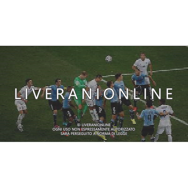 (140619) -- SAO PAULO, June 19, 2014 () -- Players jump for the ball during a Group D match between Uruguay and England of 2014 FIFA World Cup at the Arena de Sao Paulo Stadium in Sao Paulo, Brazil, June 19, 2014. Uruguay won 2-1 over England on Thursday.(/Liao Yujie)(rh) ©photoshot/Agenzia Aldo Liverani sas - ITALY ONLY - EDITORIAL USE ONLY