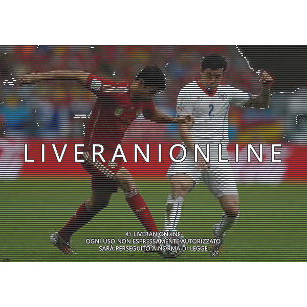 (140618) -- RIO DE JANEIRO, June 18, 2014 () -- Spain\'s Diego Costa (L) vies with Chile\'s Eugenio Mena during a Group B match between Spain and Chile of 2014 FIFA World Cup at the Estadio do Maracana Stadium in Rio de Janeiro, Brazil, June 18, 2014. Chile won 2-0 over Spain on Wednesday.(/Wang Lili)(pcy) ©photoshot/Agenzia Aldo Liverani sas - ITALY ONLY - EDITORIAL USE ONLY