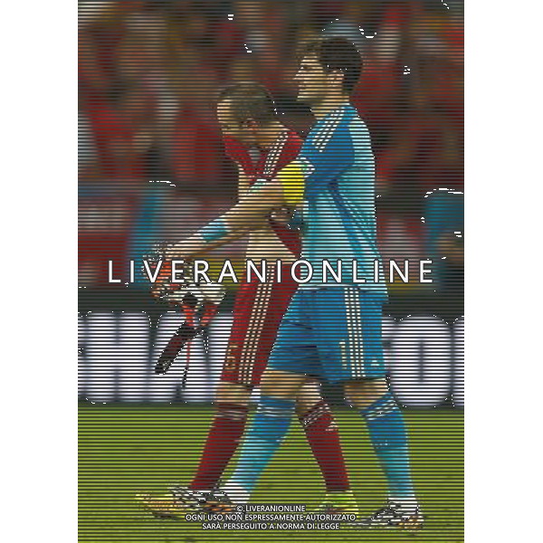 (140618) -- RIO DE JANEIRO, June 18, 2014 () -- Spain\'s goalkeeper Iker Casillas (front) leaves the field after a Group B match between Spain and Chile of 2014 FIFA World Cup at the Estadio do Maracana Stadium in Rio de Janeiro, Brazil, June 18, 2014. Chile won 2-0 over Spain on Wednesday.(/Wang Lili)(pcy) ©photoshot/Agenzia Aldo Liverani sas - ITALY ONLY - EDITORIAL USE ONLY