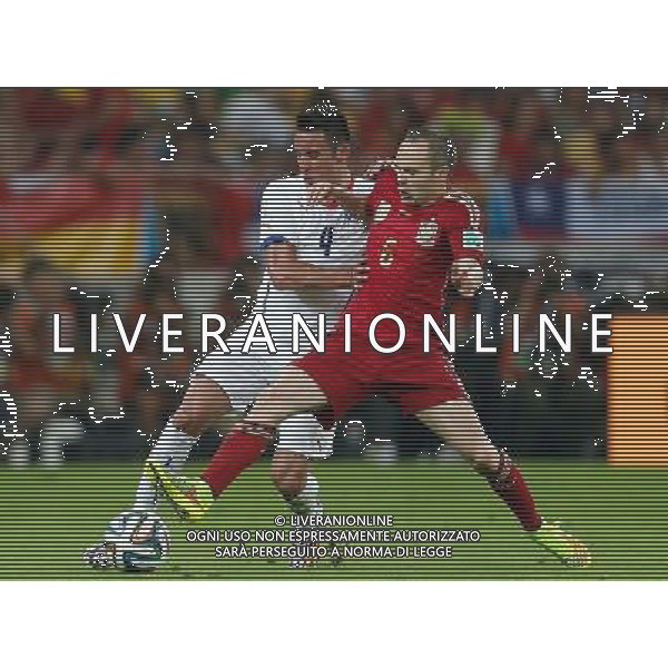 (140618) -- RIO DE JANEIRO, June 18, 2014 () -- Spain\'s Andres Iniesta (R) vies with Chile\'s Mauricio Isla during a Group B match between Spain and Chile of 2014 FIFA World Cup at the Estadio do Maracana Stadium in Rio de Janeiro, Brazil, June 18, 2014. Chile won 2-0 over Spain on Wednesday.(/Wang Lili)(pcy) ©photoshot/Agenzia Aldo Liverani sas - ITALY ONLY - EDITORIAL USE ONLY