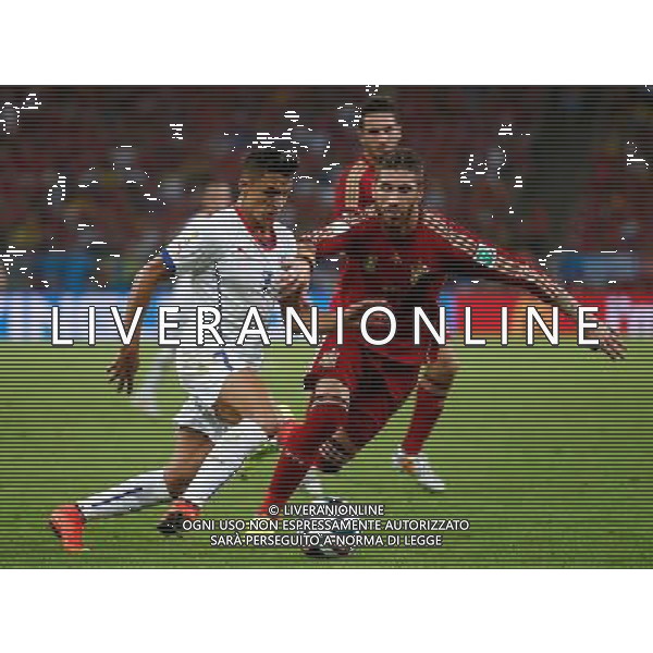(140618) -- RIO DE JANEIRO, June 18, 2014 () -- Chile\'s Alexis Sanchez (L) vies with Spain\'s Sergio Ramos during a Group B match between Spain and Chile of 2014 FIFA World Cup at the Estadio do Maracana Stadium in Rio de Janeiro, Brazil, June 18, 2014. Chile won 2-0 over Spain on Wednesday.(/Wang Lili)(pcy) ©photoshot/Agenzia Aldo Liverani sas - ITALY ONLY - EDITORIAL USE ONLY