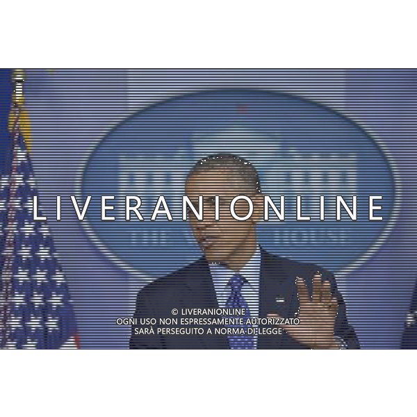 (140619) -- WASHINGTON D.C., June 19, 2014 () -- U.S. President Barack Obama speaks about situation in Iraq at the briefing room of the White House in Washington D.C., the United States, on June 19, 2014. The United States is prepared to send up to 300 military advisers to Iraq to train, advise and support Iraqi forces in their fight against insurgency, U.S. President Barack Obama said Thursday. (/Yin Bogu) ©photoshot/Agenzia Aldo Liverani sas - ITALY ONLY - EDITORIAL USE ONLY - Il presidente americano Barack Obama presso la sala briefing della Casa Bianca a Washington DC, negli Stati Uniti, 19 GIUGNO 2014.