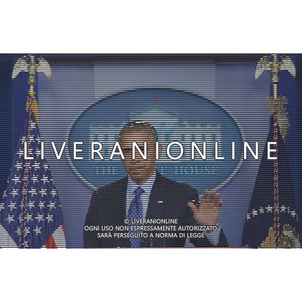 (140619) -- WASHINGTON D.C., June 19, 2014 () -- U.S. President Barack Obama speaks about situation in Iraq at the briefing room of the White House in Washington D.C., the United States, on June 19, 2014. The United States is prepared to send up to 300 military advisers to Iraq to train, advise and support Iraqi forces in their fight against insurgency, U.S. President Barack Obama said Thursday. (/Yin Bogu) ©photoshot/Agenzia Aldo Liverani sas - ITALY ONLY - EDITORIAL USE ONLY - Il presidente americano Barack Obama presso la sala briefing della Casa Bianca a Washington DC, negli Stati Uniti, 19 GIUGNO 2014.