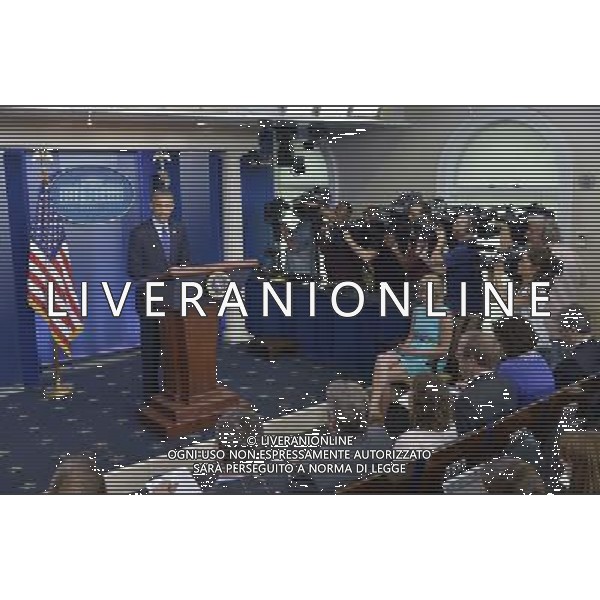 (140619) -- WASHINGTON D.C., June 19, 2014 () -- U.S. President Barack Obama speaks about situation in Iraq at the briefing room of the White House in Washington D.C., the United States, on June 19, 2014. The United States is prepared to send up to 300 military advisers to Iraq to train, advise and support Iraqi forces in their fight against insurgency, U.S. President Barack Obama said Thursday. (/Yin Bogu) ©photoshot/Agenzia Aldo Liverani sas - ITALY ONLY - EDITORIAL USE ONLY - Il presidente americano Barack Obama presso la sala briefing della Casa Bianca a Washington DC, negli Stati Uniti, 19 GIUGNO 2014.