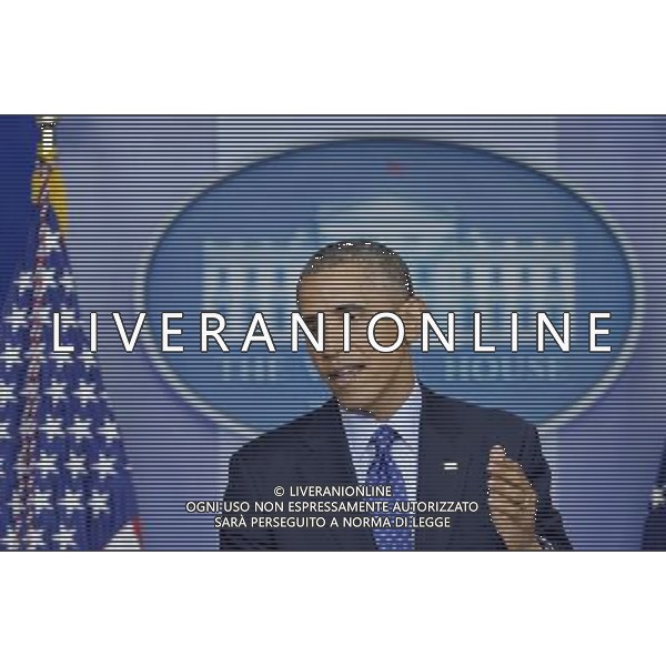 (140619) -- WASHINGTON D.C., June 19, 2014 () -- U.S. President Barack Obama speaks about situation in Iraq at the briefing room of the White House in Washington D.C., the United States, on June 19, 2014. The United States is prepared to send up to 300 military advisers to Iraq to train, advise and support Iraqi forces in their fight against insurgency, U.S. President Barack Obama said Thursday. (/Yin Bogu) ©photoshot/Agenzia Aldo Liverani sas - ITALY ONLY - EDITORIAL USE ONLY - Il presidente americano Barack Obama presso la sala briefing della Casa Bianca a Washington DC, negli Stati Uniti, 19 GIUGNO 2014.