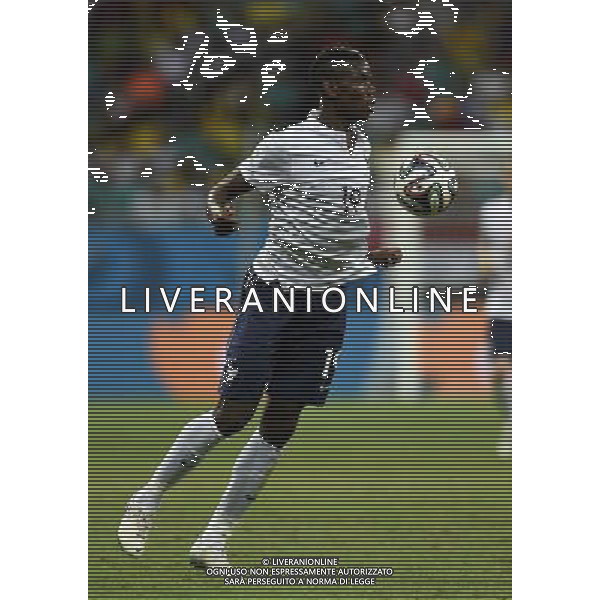 (140620) -- SALVADOR, June 20, 2014 () -- France\'s Paul Pogba stops the ball during a Group E match between Switzerland and France of 2014 FIFA World Cup at the Arena Fonte Nova Stadium in Salvador, Brazil, on June 20, 2014.(/Yang Lei)(rh) AG ALDO LIVERANI SAS ONLY ITALY