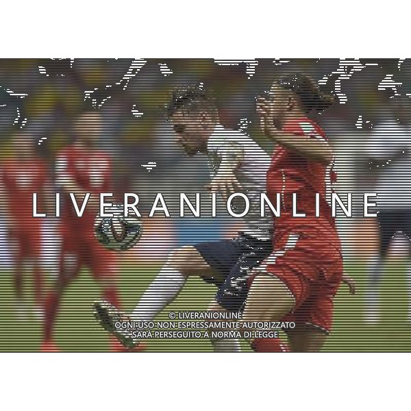 (140620) -- SALVADOR, June 20, 2014 () -- France\'s Mathieu Debuchy (L) controls the ball during a Group E match between Switzerland and France of 2014 FIFA World Cup at the Arena Fonte Nova Stadium in Salvador, Brazil, on June 20, 2014.(/Yang Lei)(rh) AG ALDO LIVERANI SAS ONLY ITALY