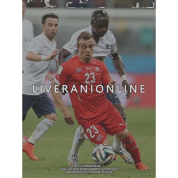 (140620) -- SALVADOR, June 20, 2014 () -- Switzerland\'s Xherdan Shaqiri (front) breaks through during a Group E match between Switzerland and France of 2014 FIFA World Cup at the Arena Fonte Nova Stadium in Salvador, Brazil, on June 20, 2014.(/Cao Can)(pcy) AG ALDO LIVERANI SAS ONLY ITALY