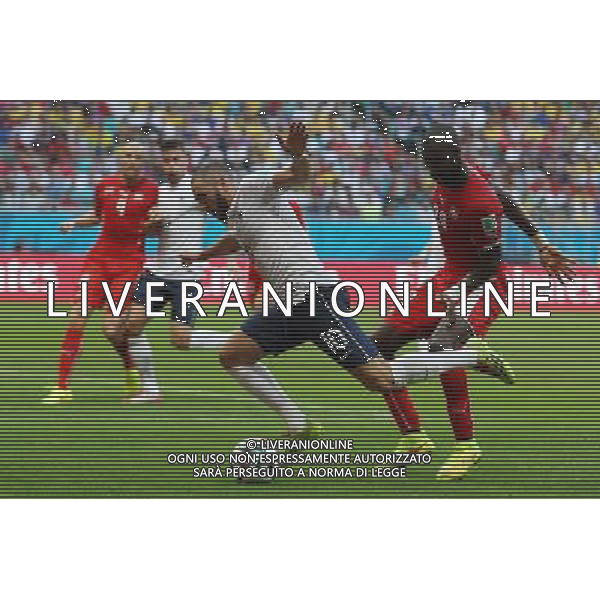 (140620) -- SALVADOR, June 20, 2014 () -- France\'s Karim Benzema (L, front) gets stumbled by Switzerland\'s Johan Djourouce (R, front) during a Group E match between Switzerland and France of 2014 FIFA World Cup at the Arena Fonte Nova Stadium in Salvador, Brazil, on June 20, 2014.(/Cao Can)(pcy) AG ALDO LIVERANI SAS ONLY ITALY