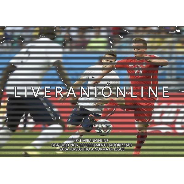 (140620) -- SALVADOR, June 20, 2014 () -- Switzerland\'s Xherdan Shaqiri (R) vies for the ball during a Group E match between Switzerland and France of 2014 FIFA World Cup at the Arena Fonte Nova Stadium in Salvador, Brazil, on June 20, 2014.(/Yang Lei)(rh) AG ALDO LIVERANI SAS ONLY ITALY