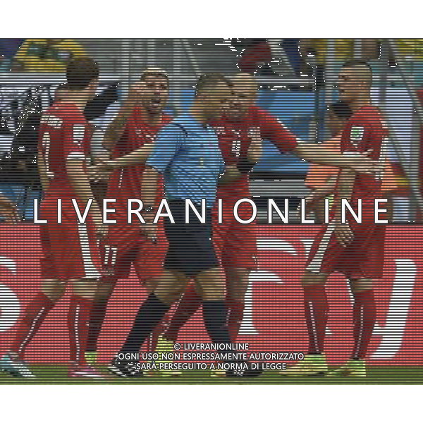 (140620) -- SALVADOR, June 20, 2014 () -- Switzerland\'s players talk with the referee during a Group E match between Switzerland and France of 2014 FIFA World Cup at the Arena Fonte Nova Stadium in Salvador, Brazil, on June 20, 2014.(/Yang Lei)(rh) AG ALDO LIVERANI SAS ONLY ITALY
