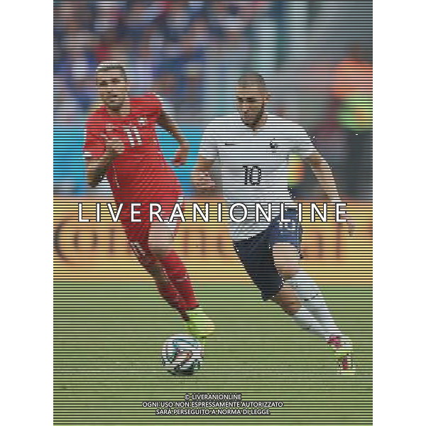 (140620) -- SALVADOR, June 20, 2014 () -- France\'s Karim Benzema (R) runs with the ball during a Group E match between Switzerland and France of 2014 FIFA World Cup at the Arena Fonte Nova Stadium in Salvador, Brazil, on June 20, 2014.(/Cao Can)(pcy) AG ALDO LIVERANI SAS ONLY ITALY