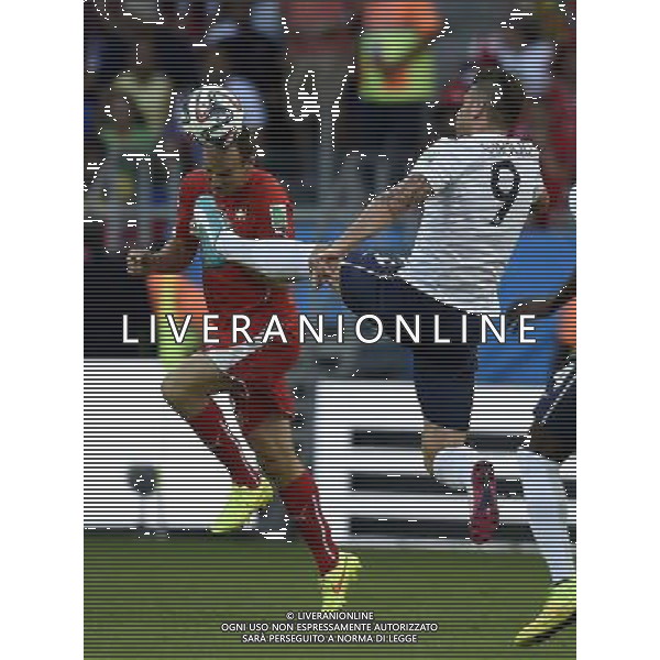 (140620) -- SALVADOR, June 20, 2014 () -- Switzerland\'s Olivier Giroud (L) vies for the ball during a Group E match between Switzerland and France of 2014 FIFA World Cup at the Arena Fonte Nova Stadium in Salvador, Brazil, on June 20, 2014.(/Yang Lei)(rh) AG ALDO LIVERANI SAS ONLY ITALY