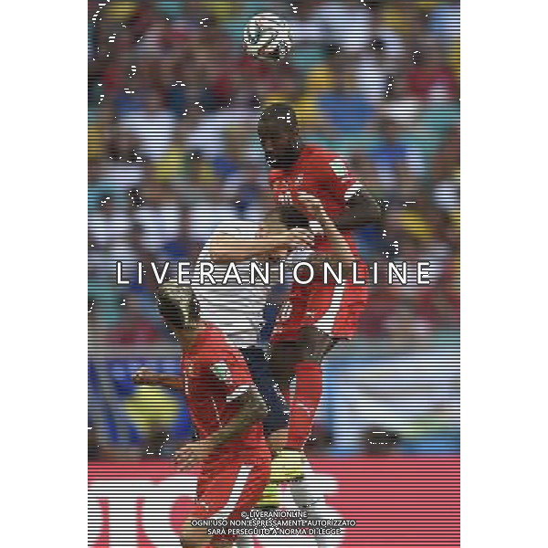(140620) -- SALVADOR, June 20, 2014 () -- Switzerland\'s Johan Djourou (up) competes a header during a Group E match between Switzerland and France of 2014 FIFA World Cup at the Arena Fonte Nova Stadium in Salvador, Brazil, on June 20, 2014.(/Yang Lei)(rh) AG ALDO LIVERANI SAS ONLY ITALY