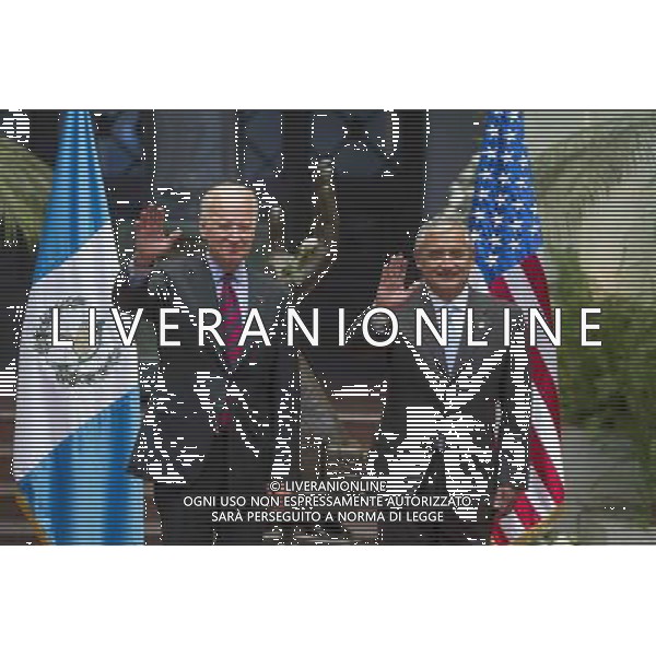 (140620) -- GUATEMALA CITY, June 20, 2014 () -- U.S. Vice President Joe Biden (L), and Guatemala\'s President Otto Perez Molina, wave upon their arrival at the National Palace of Culture, in Guatemala City, capital of Guatemala, on June 20, 2014. Biden arrived in Guatemala City on Friday as part of his Latin American tour to discuss the rising tide of unaccompanied Central American minors crossing the U.S. border. (/Luis Echeverria) (jg) (sp) AG ALDOL IVERANI SAS ONLY ITALY