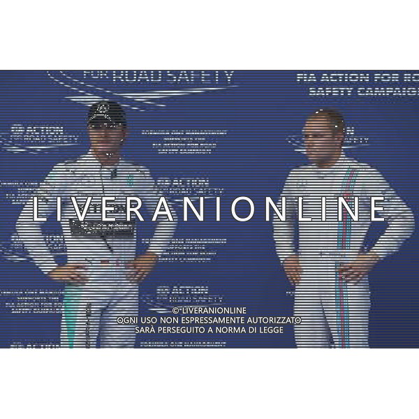 Nico Rosberg (GER) Mercedes AMG F1 W05 and Valtteri Bottas (FIN) Williams FW36. 21.06.2014. Formula 1 World Championship, Rd 8, Austrian Grand Prix, Spielberg, Austria, Qualifying Day. - www.xpbimages.com, EMail: requests@xpbimages.com - copy of publication required for printed pictures. Every used picture is fee-liable. © Copyright: Batchelor / XPB Images AG ALDO LIVERANI SAS ONLY ITALY