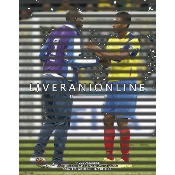 (140620) -- CURITIBA, June 20, 2014 () -- Antonio Valencia (R) of Ecuador speaks with a player of Honduras after a Group E match between Honduras and Ecuador of 2014 FIFA World Cup at the Arena da Baixada Stadium in Curitiba, Brazil, June 20, 2014. Ecuador beat Honduras 2-1. (/Liao Yujie)(zc) AG ALDO LIVERANI SAS ONLY ITALY