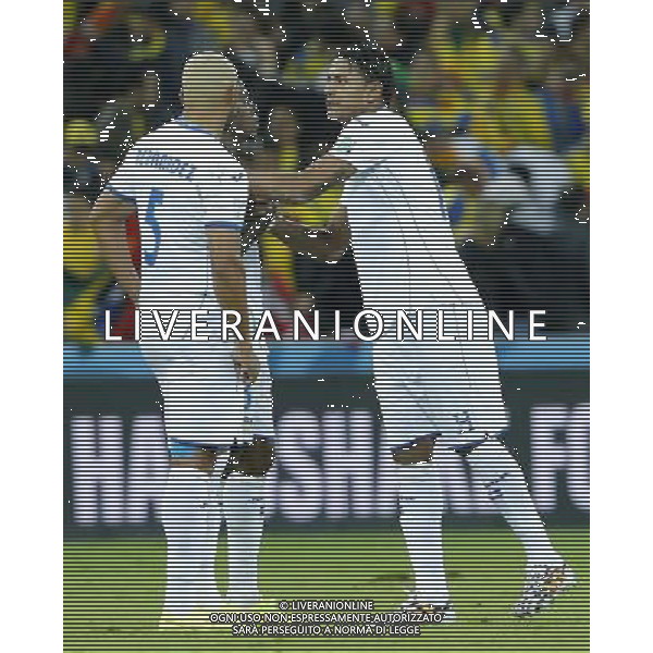 (140620) -- CURITIBA, June 20, 2014 () -- Carlo Costly (R) of Honduras comforts his teammate after a Group E match between Honduras and Ecuador of 2014 FIFA World Cup at the Arena da Baixada Stadium in Curitiba, Brazil, June 20, 2014. Honduras lost the match 1-2. (/Zhou Lei)(zc) AG ALDO LIVERANI SAS ONLY ITALY