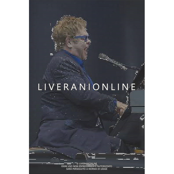 Sir Elton John CBE (Reginald Kenneth Dwight) performs at Leigh Sports Village, Leigh, Lancashire, England, 21st June 2014. ©photoshot/AGENZIA ALDO LIVERANI SAS - ITALY ONLY - EDITORIAL USE ONLY