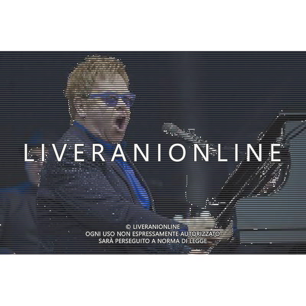 Sir Elton John CBE (Reginald Kenneth Dwight) performs at Leigh Sports Village, Leigh, Lancashire, England, 21st June 2014. ©photoshot/AGENZIA ALDO LIVERANI SAS - ITALY ONLY - EDITORIAL USE ONLY