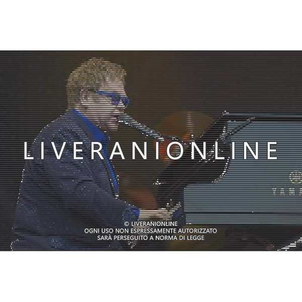 Sir Elton John CBE (Reginald Kenneth Dwight) performs at Leigh Sports Village, Leigh, Lancashire, England, 21st June 2014. ©photoshot/AGENZIA ALDO LIVERANI SAS - ITALY ONLY - EDITORIAL USE ONLY