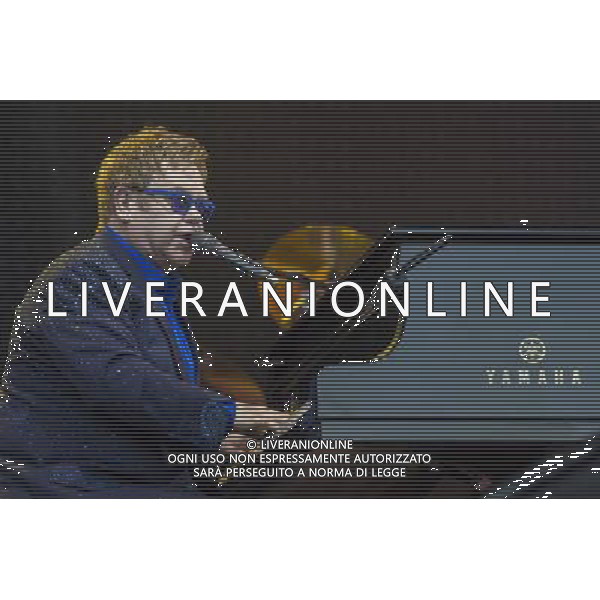 Sir Elton John CBE (Reginald Kenneth Dwight) performs at Leigh Sports Village, Leigh, Lancashire, England, 21st June 2014. ©photoshot/AGENZIA ALDO LIVERANI SAS - ITALY ONLY - EDITORIAL USE ONLY