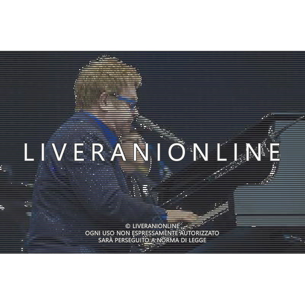 Sir Elton John CBE (Reginald Kenneth Dwight) performs at Leigh Sports Village, Leigh, Lancashire, England, 21st June 2014. ©photoshot/AGENZIA ALDO LIVERANI SAS - ITALY ONLY - EDITORIAL USE ONLY