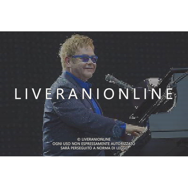 Sir Elton John CBE (Reginald Kenneth Dwight) performs at Leigh Sports Village, Leigh, Lancashire, England, 21st June 2014. ©photoshot/AGENZIA ALDO LIVERANI SAS - ITALY ONLY - EDITORIAL USE ONLY