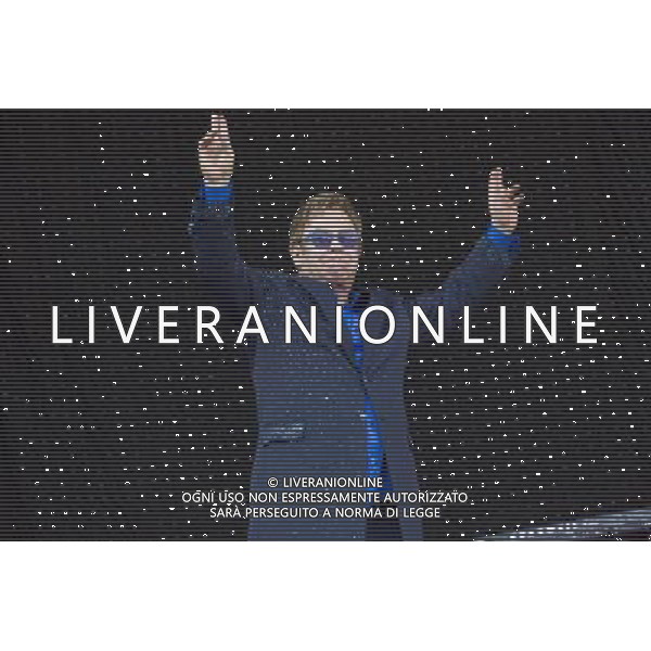 Sir Elton John CBE (Reginald Kenneth Dwight) performs at Leigh Sports Village, Leigh, Lancashire, England, 21st June 2014. ©photoshot/AGENZIA ALDO LIVERANI SAS - ITALY ONLY - EDITORIAL USE ONLY