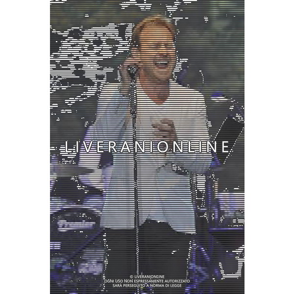 Jason Donovan performs on stage at the Hampton Court Palace Festival, East Molesey, Surrey on Friday 20 June 2014. ©PHOTOSHOT/AGENZIA ALDO LIVERANI SAS - ITALY ONLY - EDITORIAL USE ONLY
