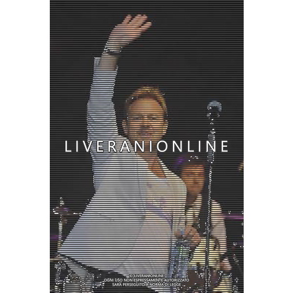 Jason Donovan performs on stage at the Hampton Court Palace Festival, East Molesey, Surrey on Friday 20 June 2014. ©PHOTOSHOT/AGENZIA ALDO LIVERANI SAS - ITALY ONLY - EDITORIAL USE ONLY
