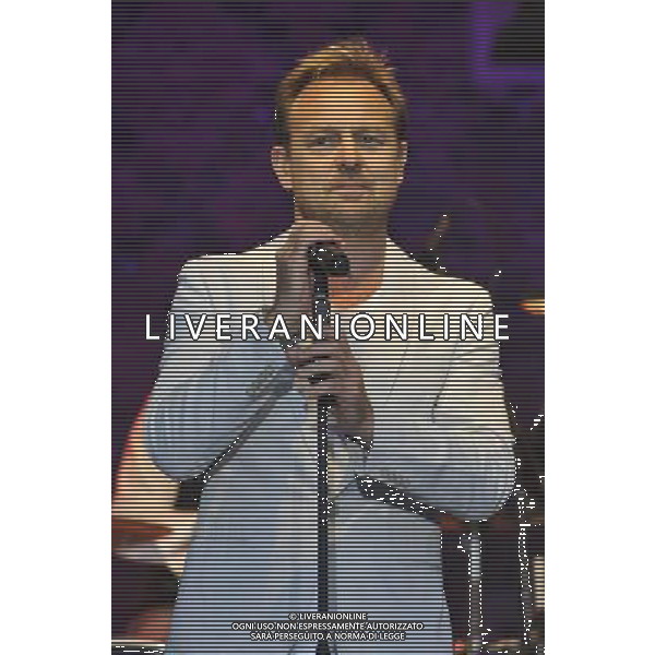 Jason Donovan performs on stage at the Hampton Court Palace Festival, East Molesey, Surrey on Friday 20 June 2014. ©PHOTOSHOT/AGENZIA ALDO LIVERANI SAS - ITALY ONLY - EDITORIAL USE ONLY