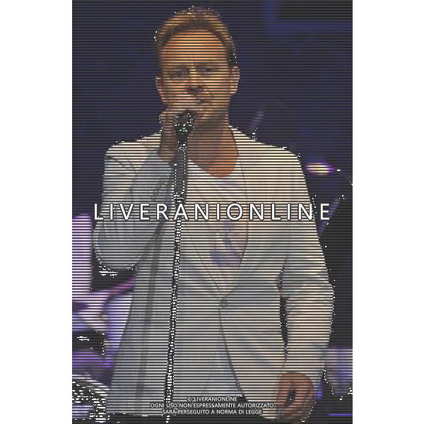 Jason Donovan performs on stage at the Hampton Court Palace Festival, East Molesey, Surrey on Friday 20 June 2014. ©PHOTOSHOT/AGENZIA ALDO LIVERANI SAS - ITALY ONLY - EDITORIAL USE ONLY