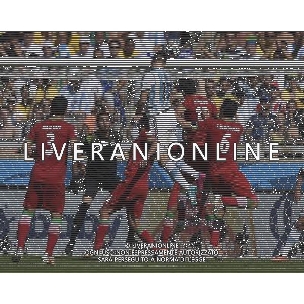 (140621) -- BELO HORIZONTE, June 21, 2014 () -- Federico Fernandez (top) of Argentina heads the ball to shoot during a Group F match between Argentina and Iran of 2014 FIFA World Cup at the Estadio Mineirao Stadium in Belo Horizonte, Brazil, June 21, 2014. (/Qi Heng)(wll) ©PHOTOSHOT/AGENZIA ALDO LIVERANI SAS - ITALY ONLY - EDITORIAL USE ONLY - ARGENTINA Vs IRAN partita del gruppo di F Coppa del mondo FIFA 2014 Mineirao stadio Estadio a Belo Horizonte, in Brasile, 21 giugno 2014