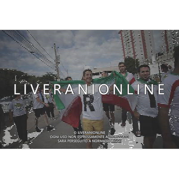 (140621) -- BELO HORIZONTE, June 21, 2014 () -- Iran s fans arrive at the Estadio Minerao Stadium to watch a Group F match between Argentina and Iran of 2014 FIFA World Cup, Belo Horizonte, in Brazil, June 21, 2014. (/Mauricio Valenzuela) (mv) (SP)BRAZIL-BELO HORIZONTE-WORLD CUP 2014-ARGENTINA VS IRAN-FANS PUBLICATIONxNOTxINxCHN Belo Horizons June 21 2014 Iran s supporters arrive AT The Estadio Stage to Watch A Group F Match between Argentina and Iran of 2014 FIFA World Cup Belo Horizons in Brazil June 21 2014 Mauricio Valenzuela MV SP Brazil Belo Horizons World Cup 2014 Argentina vs Iran supporters PUBLICATIONxNOTxINxCHN ©PHOTOSHOT/AGENZIA ALDO LIVERANI SAS - ITALY ONLY - EDITORIAL USE ONLY - ARGENTINA Vs IRAN partita del gruppo di F Coppa del mondo FIFA 2014 Mineirao stadio Estadio a Belo Horizonte, in Brasile, 21 giugno 2014