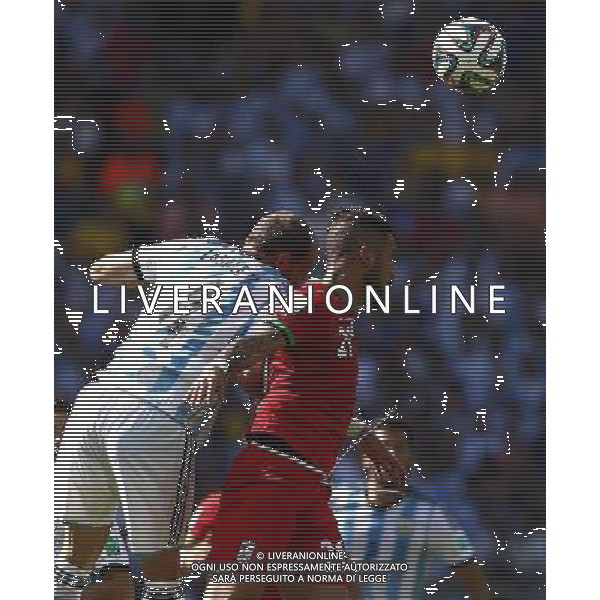 (140621) -- BELO HORIZONTE, June 21, 2014 () -- Pablo Zabaleta (L) of Argentina fights for the header with Ashkan Dejagah of Iran during a Group F match between Argentina and Iran of 2014 FIFA World Cup at the Estadio Mineirao Stadium in Belo Horizonte, Brazil, June 21, 2014. (/Liu Bin)(zc) ©PHOTOSHOT/AGENZIA ALDO LIVERANI SAS - ITALY ONLY - EDITORIAL USE ONLY - ARGENTINA Vs IRAN partita del gruppo di F Coppa del mondo FIFA 2014 Mineirao stadio Estadio a Belo Horizonte, in Brasile, 21 giugno 2014