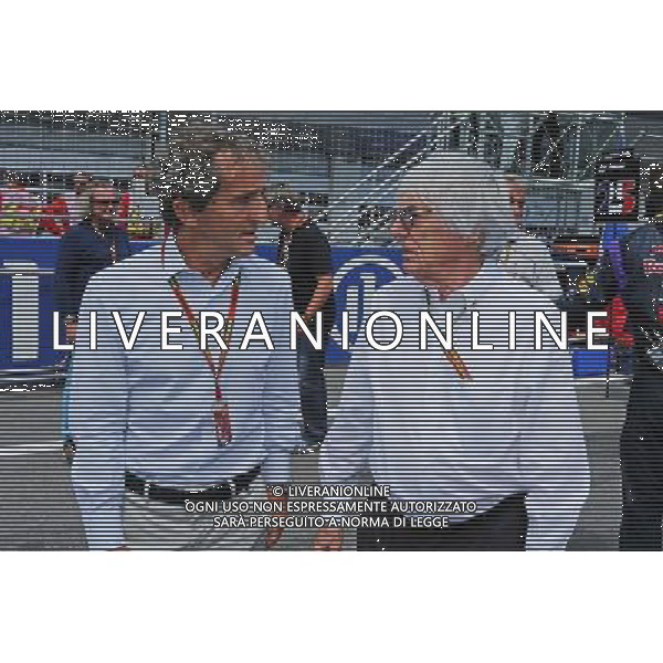 (L to R): Alain Prost (FRA) on the grid with Bernie Ecclestone (GBR). 22.06.2014. Formula 1 World Championship, Rd 8, Austrian Grand Prix, Spielberg, Austria, Race Day. - www.xpbimages.com, EMail: requests@xpbimages.com - copy of publication required for printed pictures. Every used picture is fee-liable. © Copyright: Moy / XPB Images AG ALDO LIVERANI SAS ONLY ITALY