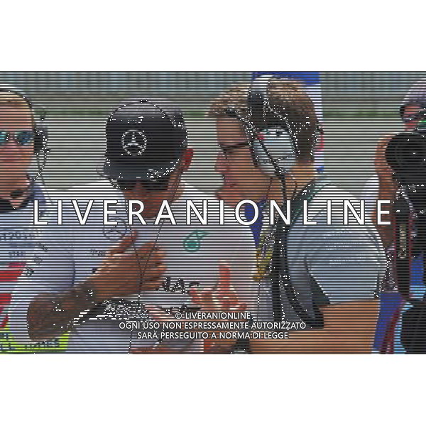Lewis Hamilton (GBR) Mercedes AMG F1 on the grid with Peter Bonnington (GBR) Mercedes AMG F1 Race Engineer. 22.06.2014. Formula 1 World Championship, Rd 8, Austrian Grand Prix, Spielberg, Austria, Race Day. - www.xpbimages.com, EMail: requests@xpbimages.com - copy of publication required for printed pictures. Every used picture is fee-liable. © Copyright: Moy / XPB Images AG ALDO LIVERANI SAS ONLY ITALY