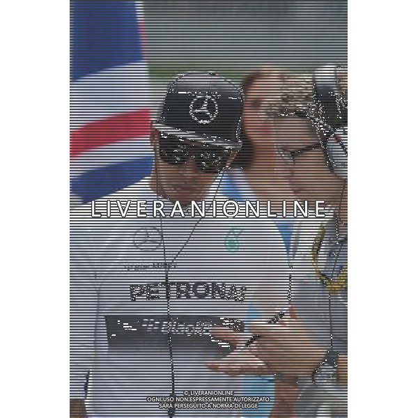Lewis Hamilton (GBR) Mercedes AMG F1 on the grid with Peter Bonnington (GBR) Mercedes AMG F1 Race Engineer. 22.06.2014. Formula 1 World Championship, Rd 8, Austrian Grand Prix, Spielberg, Austria, Race Day. - www.xpbimages.com, EMail: requests@xpbimages.com - copy of publication required for printed pictures. Every used picture is fee-liable. © Copyright: Moy / XPB Images AG ALDO LIVERANI SAS ONLY ITALY
