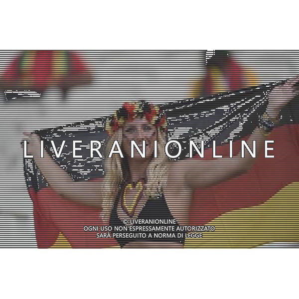 (140621) -- FORTALEZA, June 21, 2014 () -- A fan of Germany poses ahead of a Group G match between Germany and Ghana of 2014 FIFA World Cup at the Estadio Castelao Stadium in Fortaleza, Brazil, June 21, 2014. (/Yang Lei)(zc) ©PHOTOSHOT/AGENZIA ALDO LIVERANI SAS - ITALY ONLY - EDITORIAL USE ONLY - GERMANIA Vs GHANA Partita del gruppo G Coppa del mondo 2014 FIFA World Cup Castelao stadio Estadio a Fortaleza, in Brasile, 21 giugno 2014