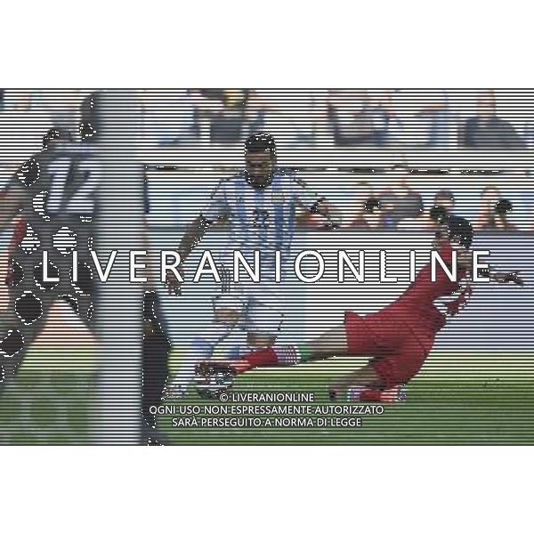 (140621) -- BELO HORIZONTE, June 21, 2014 () -- Ezequiel Lavezzi (C) of Argentina vies with Mehrdad Pouladi(R) of Iran during a Group F match between Argentina and Iran of 2014 FIFA World Cup at the Estadio Mineirao Stadium in Belo Horizonte, Brazil, June 21, 2014. Argentina won 1-0. (/Qi Heng)(wll) ©PHOTOSHOT/AGENZIA ALDO LIVERANI SAS - ITALY ONLY - EDITORIAL USE ONLY - ARGENTINA Vs IRAN partita del gruppo di F Coppa del mondo FIFA 2014 Mineirao stadio Estadio a Belo Horizonte, in Brasile, 21 giugno 2014