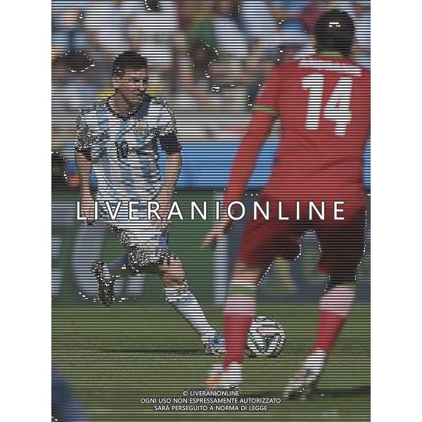 (140621) -- BELO HORIZONTE, June 21, 2014 () -- Lionel Messi (L) of Argentina breaks through during a Group F match between Argentina and Iran of 2014 FIFA World Cup at the Estadio Mineirao Stadium in Belo Horizonte, Brazil, June 21, 2014. Argentina won 1-0. (/Qi Heng)(wll) ©PHOTOSHOT/AGENZIA ALDO LIVERANI SAS - ITALY ONLY - EDITORIAL USE ONLY - ARGENTINA Vs IRAN partita del gruppo di F Coppa del mondo FIFA 2014 Mineirao stadio Estadio a Belo Horizonte, in Brasile, 21 giugno 2014