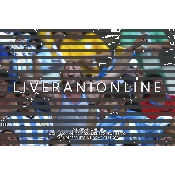 (140621) -- BELO HORIZONTE, June 21, 2014 () -- Fans of Argentina celebrates the team\'s victory over Iran during a Group F match between Argentina and Iran of 2014 FIFA World Cup at the Estadio Mineirao Stadium in Belo Horizonte, Brazil, June 21, 2014. Argentina beat Iran 1-0. (/Liu Bin)(zc) ©PHOTOSHOT/AGENZIA ALDO LIVERANI SAS - ITALY ONLY - EDITORIAL USE ONLY - ARGENTINA Vs IRAN partita del gruppo di F Coppa del mondo FIFA 2014 Mineirao stadio Estadio a Belo Horizonte, in Brasile, 21 giugno 2014
